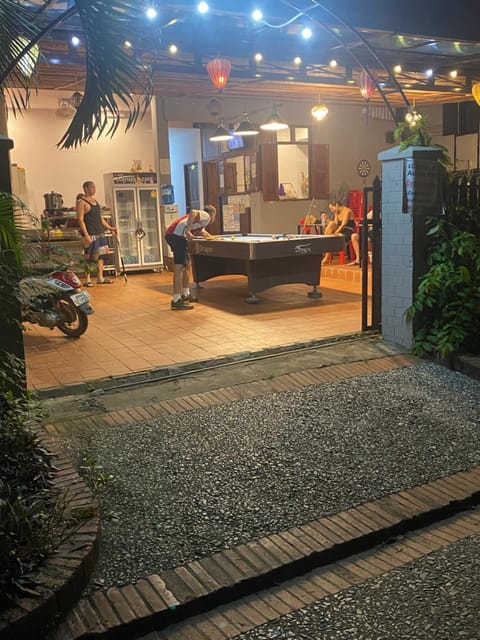 Patio, Communal lounge/ TV room, Night, People, Billiard, Living room, Lobby or reception, Seating area, Evening entertainment, Location, group of guests, Parking