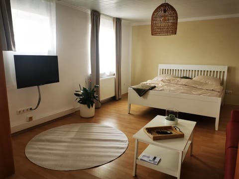 Bed, TV and multimedia, Living room, Bedroom
