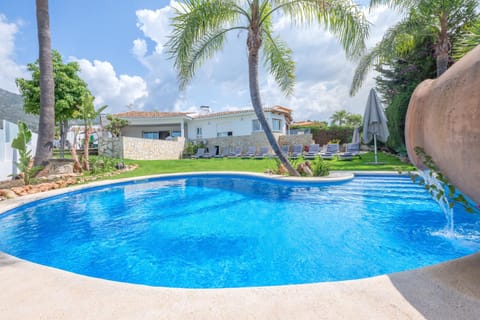 Property building, Living room, Swimming pool