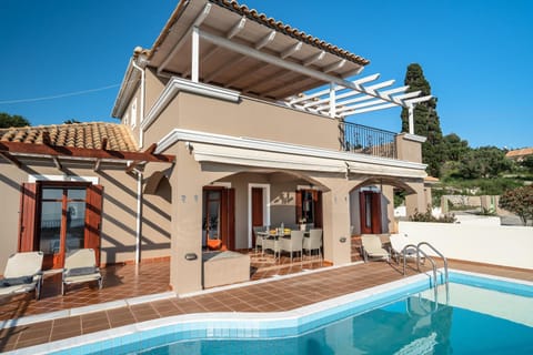 Property building, Living room, Swimming pool