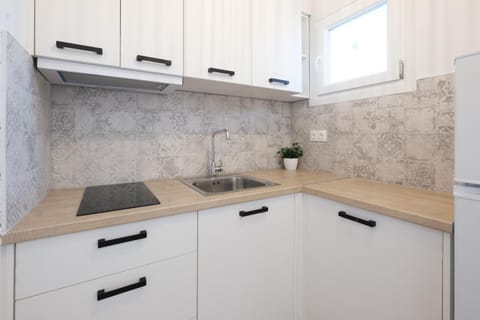 Kitchen or kitchenette, stove