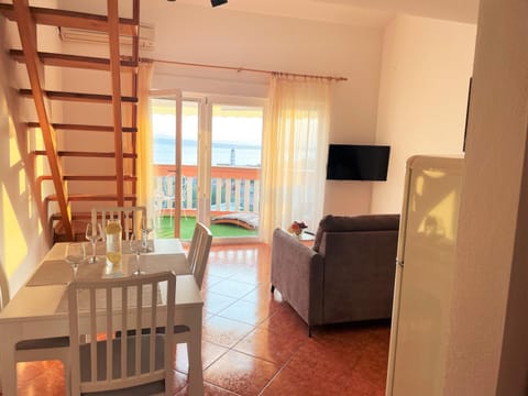 Living room, Seating area, Sea view, air conditioner