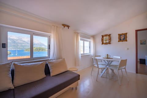 Natural landscape, Living room, Seating area, Dining area