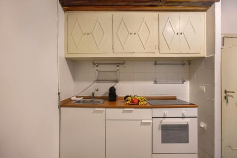 Kitchen or kitchenette, oven, stove