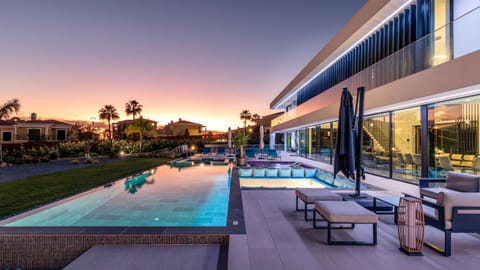 Property building, Pool view, Swimming pool, sunbed