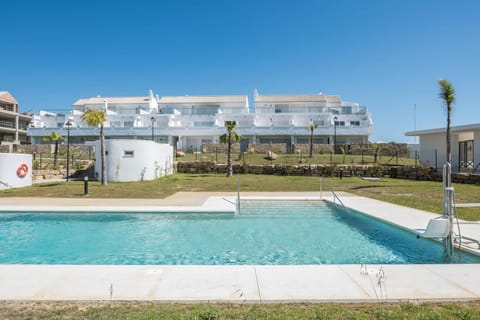 Property building, Living room, Swimming pool