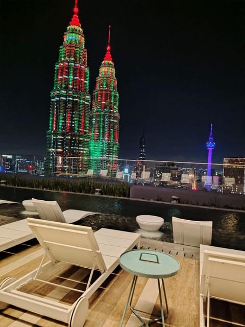 Property building, Night, View (from property/room), City view, Swimming pool