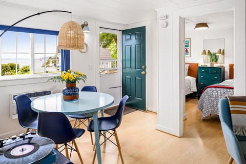 Bed, Living room, Seating area, Dining area, Sea view