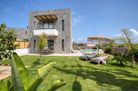 Property building, Seating area, Swimming pool, sunbed