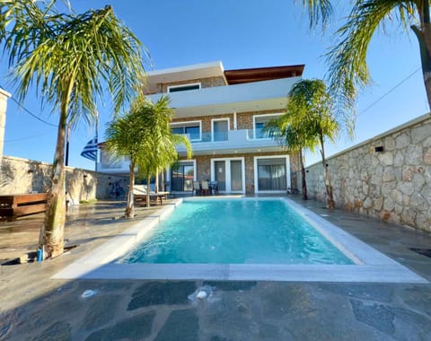 Property building, Pool view, Swimming pool, sunbed