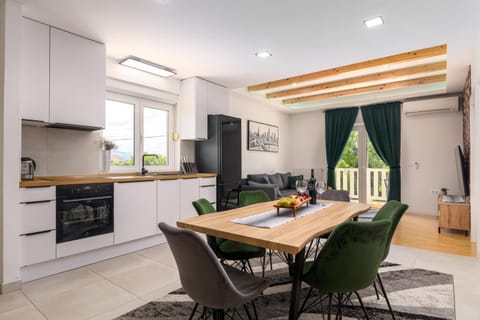 Kitchen or kitchenette, Living room, Seating area, Dining area, oven, stove, kitchen