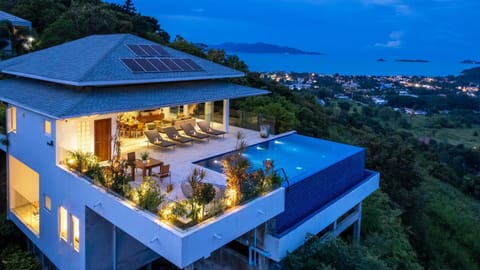 Property building, Night, Natural landscape, View (from property/room), Sea view