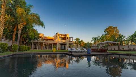 Property building, Day, Natural landscape, Garden, Garden view, Pool view, Swimming pool