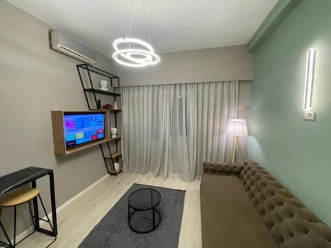 TV and multimedia, Living room, Seating area, air conditioner