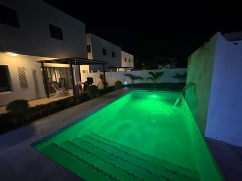Property building, Night, Pool view, Swimming pool