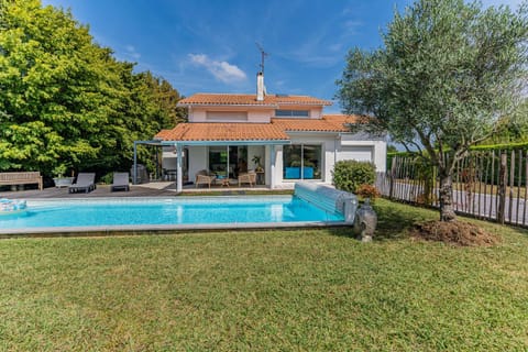 Property building, Living room, Swimming pool