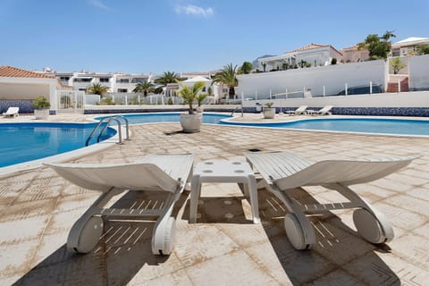 Property building, Living room, Swimming pool