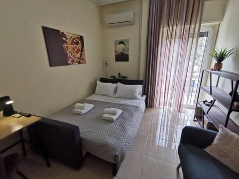 Bed, Living room, towels, air conditioner