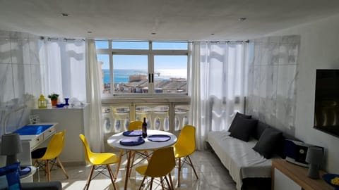 TV and multimedia, View (from property/room), Living room, Seating area, Dining area, Sea view