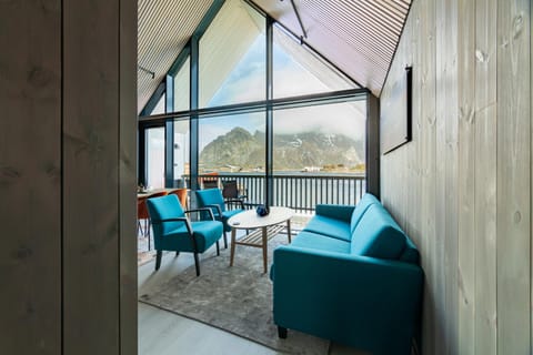 View (from property/room), Living room, Seating area, Mountain view, Sea view