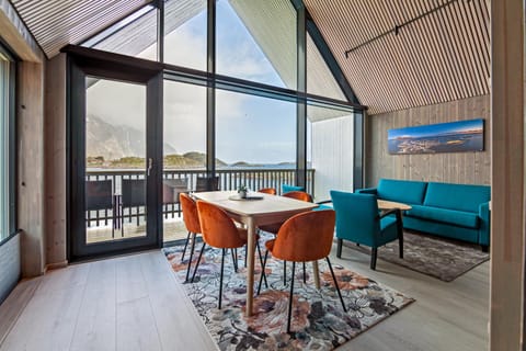 View (from property/room), Balcony/Terrace, Living room, Seating area, Dining area, Mountain view, Sea view