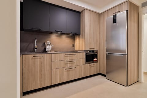 Kitchen or kitchenette, oven, stove, toaster