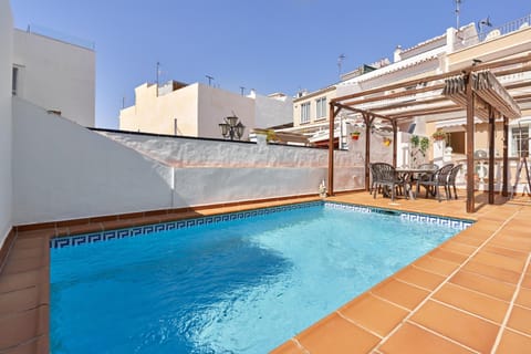 Property building, Living room, Swimming pool
