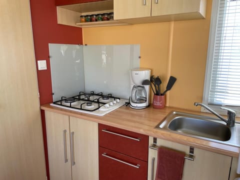 Kitchen or kitchenette, stove