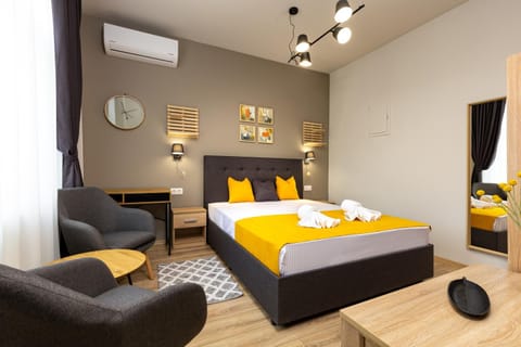 Bed, Seating area, Bedroom, towels, air conditioner