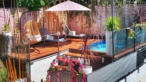 Property building, Living room, Swimming pool