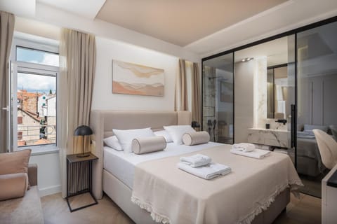Shower, Bed, Bathroom, Photo of the whole room, Seating area, Bedroom, oven, towels