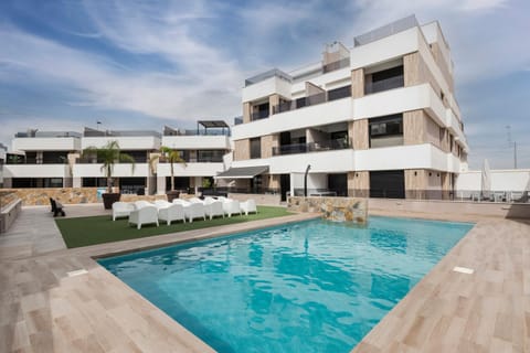 Property building, Living room, Swimming pool