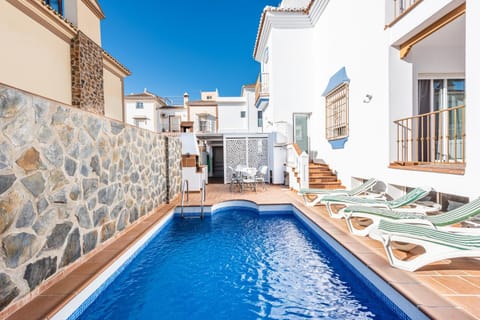 Property building, Living room, Swimming pool