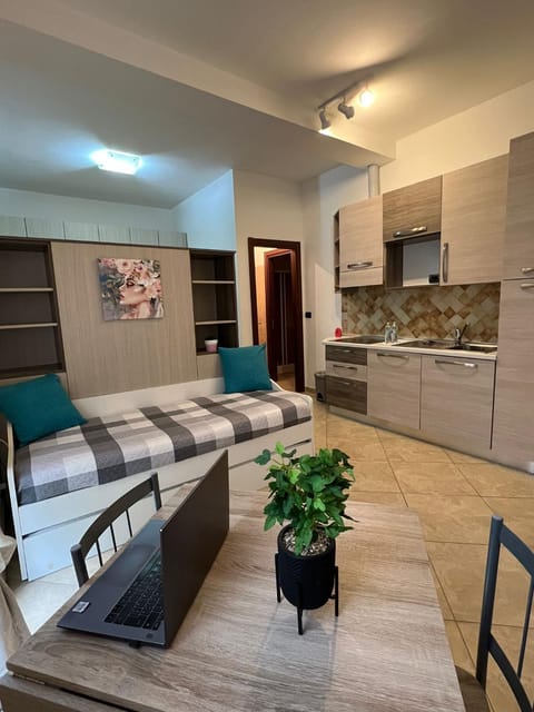 Kitchen or kitchenette, Photo of the whole room, Seating area, Dining area, stove