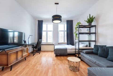 Communal lounge/ TV room, Bed, Living room, Seating area, Bedroom