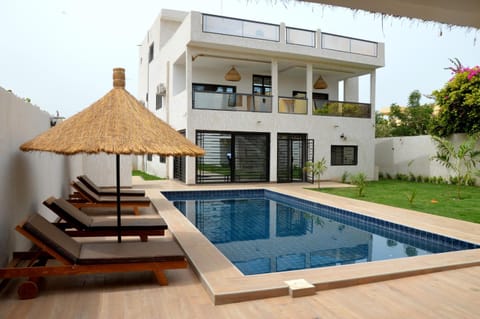 Property building, Patio, Day, Garden, Garden view, Pool view, Swimming pool, sunbed