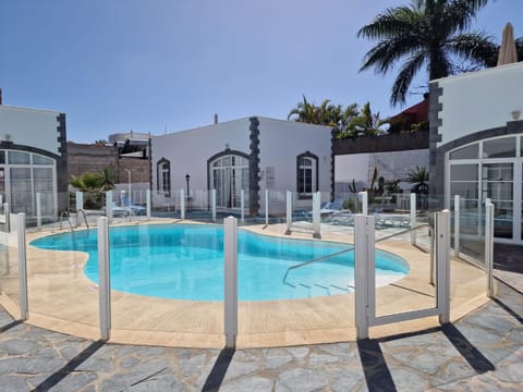 Property building, Pool view, Swimming pool, sunbed