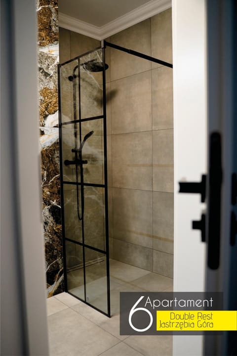 Shower, Toilet, Bathroom, hair dryier, towels, laundry, washing machine, dryer