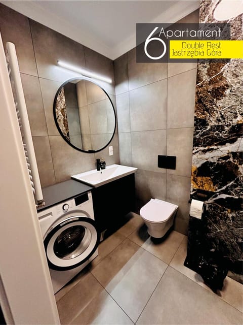 Toilet, Bathroom, hair dryier, towels, laundry, washing machine, dryer