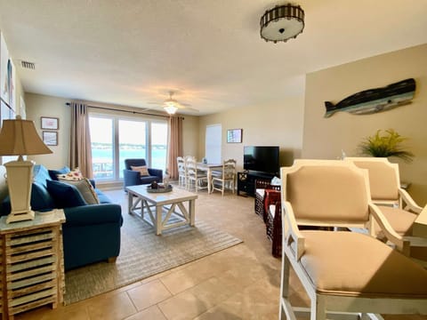 Sea Oats E202 by ALBVR - Pet Friendly Direct Lagoon Front Renovated 2BR, 2BA Condo, Outdoor Pools, Pier, and Dedicated Beach Access House in West Beach