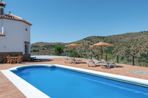 Property building, Living room, Swimming pool