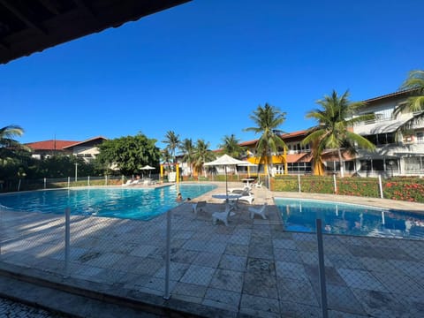 Property building, Day, Pool view, Swimming pool, sunbed