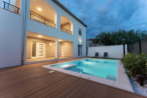 Property building, Patio, Pool view, Swimming pool