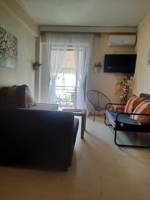 TV and multimedia, Living room, Seating area, air conditioner, air conditioner