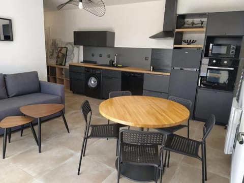 Seating area, Dining area, dishwasher, oven, stove, toaster
