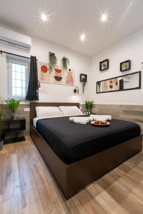 Bedroom, furniture, towels, air conditioner