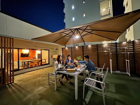 Patio, Night, People, View (from property/room), Balcony/Terrace, Dining area