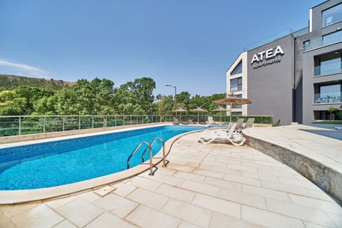 Day, Natural landscape, Swimming pool, sunbed