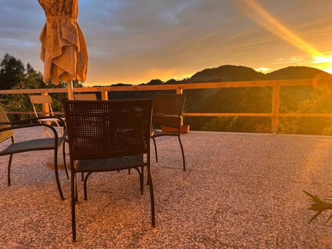Property building, Patio, Day, Natural landscape, View (from property/room), Balcony/Terrace, Dining area, Mountain view, Sunrise, Sunset