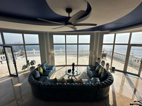 View (from property/room), Balcony/Terrace, Living room, Seating area, Sea view